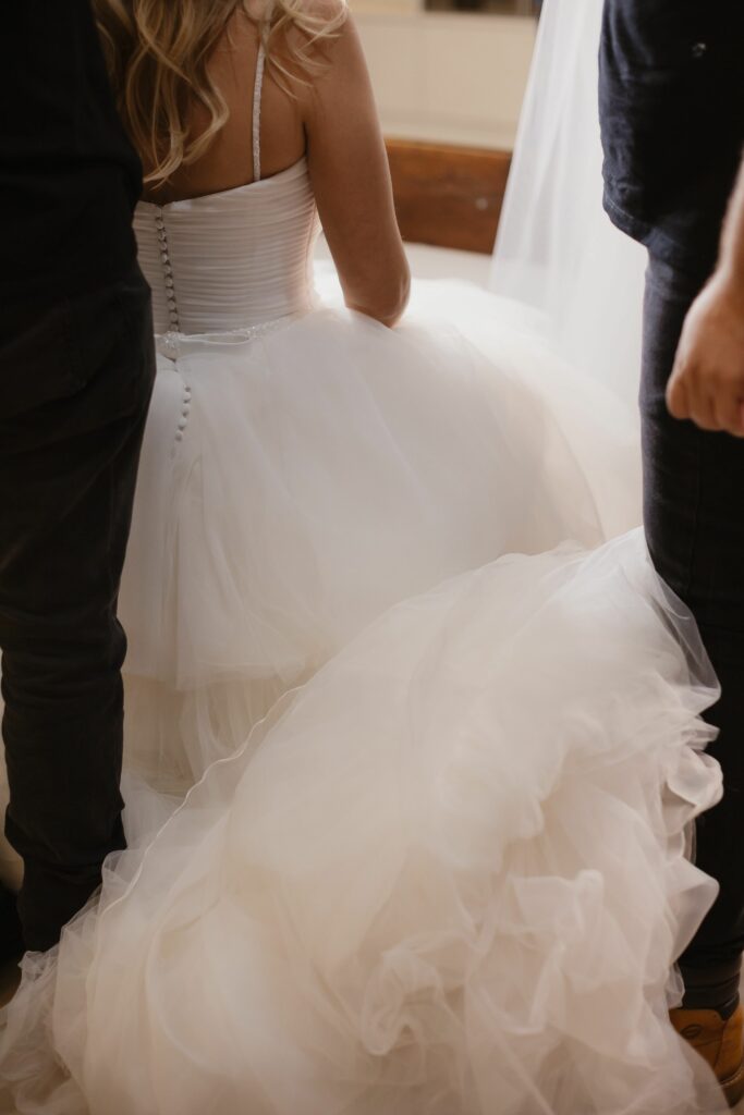 What Actually Happens During Wedding Dress Alterations?